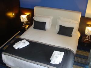 Postel nebo postele na pokoji v ubytování Monte Mare Hotel