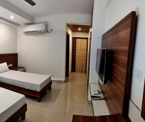 Televisyen dan/atau pusat hiburan di Pride Home
