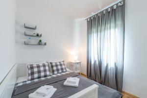 Posteľ alebo postele v izbe v ubytovaní Villa Donato with Jacuzzi