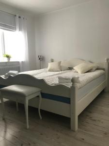 Un pat sau paturi într-o cameră la Villa Daga