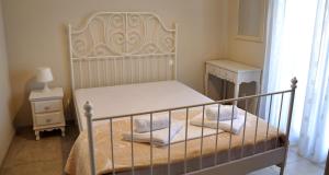 Posteľ alebo postele v izbe v ubytovaní Twin Villas