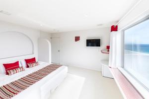 TV tai viihdekeskus majoituspaikassa Hotel Sea Shell