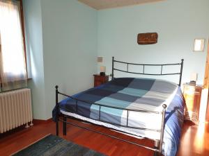 Postel nebo postele na pokoji v ubytování Piccolo Paradiso