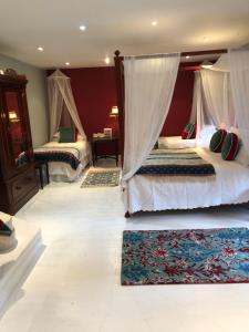 Postel nebo postele na pokoji v ubytování Barnabrow Country House