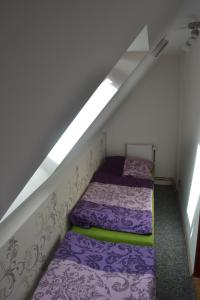 Postel nebo postele na pokoji v ubytování Apartmán Anežka Albrechtice