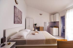 Postel nebo postele na pokoji v ubytování Apartments Korda L&M- Suhi Potok