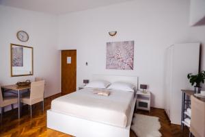 Postel nebo postele na pokoji v ubytování Apartments Korda L&M- Suhi Potok