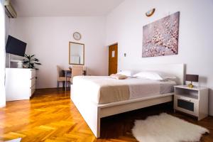 Postel nebo postele na pokoji v ubytování Apartments Korda L&M- Suhi Potok