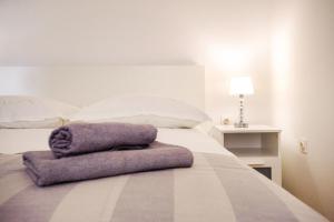 Postel nebo postele na pokoji v ubytování Apartments Korda L&M- Suhi Potok
