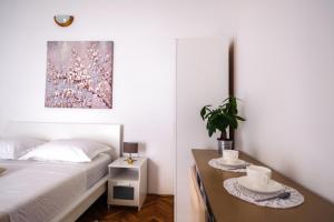Postel nebo postele na pokoji v ubytování Apartments Korda L&M- Suhi Potok