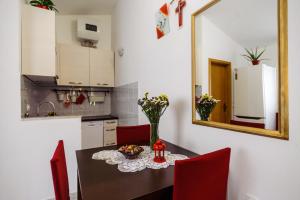Kuchyň nebo kuchyňský kout v ubytování Apartments Korda L&M- Suhi Potok