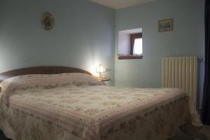 Postel nebo postele na pokoji v ubytování Anticarua B&B