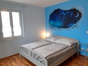 Posteľ alebo postele v izbe v ubytovaní Appartementhaus Freiler