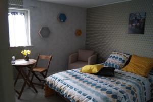 Postel nebo postele na pokoji v ubytování À La Maison Du Bonheur