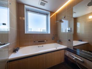Koupelna v ubytování APA Hotel PRIDE Akasaka Kokkaigijidomae