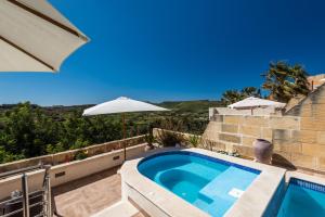 Fotografie z fotogalerie ubytování DGolden Valley Boutique v destinaci Xagħra