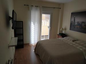 Postel nebo postele na pokoji v ubytování benalmadena nuevatorrequebrada + 18 fotografií