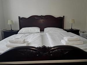 Ένα ή περισσότερα κρεβάτια σε δωμάτιο στο Hotel Union