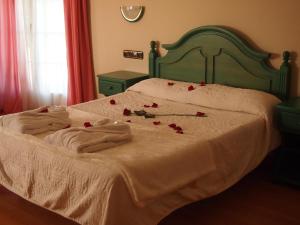 Letto o letti in una camera di Hotel Mitra Crisálida