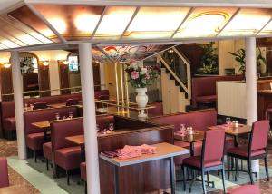 Restaurace v ubytování Le CESAR HOTEL
