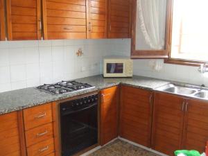 Kuchyňa alebo kuchynka v ubytovaní Les oliveres de l'Empordà