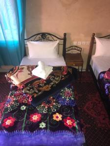 Ένα ή περισσότερα κρεβάτια σε δωμάτιο στο Auberge Restaurant Zahra