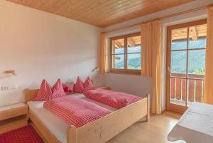 Postel nebo postele na pokoji v ubytování Gönnerhof