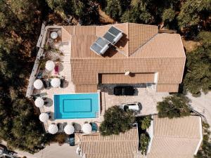 an overhead view of a house with a swimming pool at Elena apt in Kalami