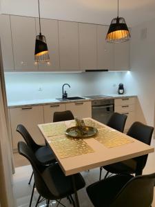 Kuchyňa alebo kuchynka v ubytovaní Apartament Zacisze De LUX