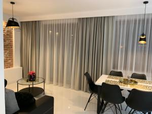 Posedenie v ubytovaní Apartament Zacisze De LUX