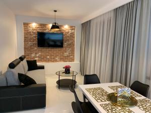 Posedenie v ubytovaní Apartament Zacisze De LUX