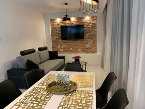 Posedenie v ubytovaní Apartament Zacisze De LUX