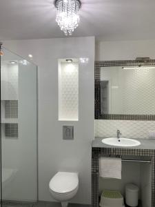 Kúpeľňa v ubytovaní Apartament Zacisze De LUX + 32 fotografií