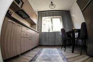 Η κουζίνα ή μικρή κουζίνα στο Tania Apartament