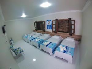 Cama ou camas em um quarto em Pousada Portugal