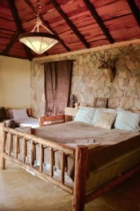 Cama o camas de una habitación en Rancho Tierra Alta