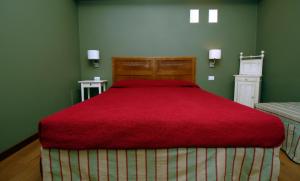Postel nebo postele na pokoji v ubytování B&B Residenza Cavour