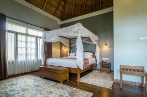 Postel nebo postele na pokoji v ubytování Emburara Farm Lodge