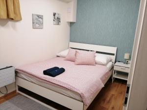 Posteľ alebo postele v izbe v ubytovaní Apartments Relax