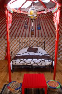 Een bed of bedden in een kamer bij Valle de Oro