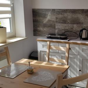 Kuchyňa alebo kuchynka v ubytovaní Apartament Bernadett