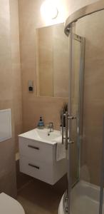 Kúpeľňa v ubytovaní Apartament Bernadett