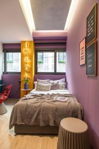 Posteľ alebo postele v izbe v ubytovaní 14 Reasons Why Hotel Psirri