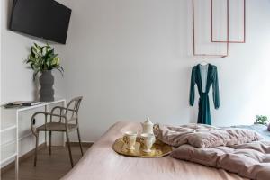 Posteľ alebo postele v izbe v ubytovaní 14 Reasons Why Hotel Psirri