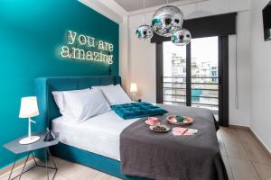 Posteľ alebo postele v izbe v ubytovaní 14 Reasons Why Hotel Psirri