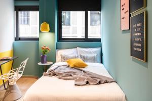 Posteľ alebo postele v izbe v ubytovaní 14 Reasons Why Hotel Psirri