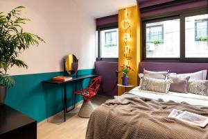 Posteľ alebo postele v izbe v ubytovaní 14 Reasons Why Hotel Psirri