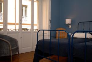 Postel nebo postele na pokoji v ubytování B&B Residenza Cavour