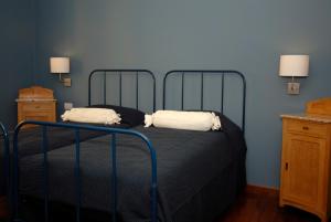 Postel nebo postele na pokoji v ubytování B&B Residenza Cavour
