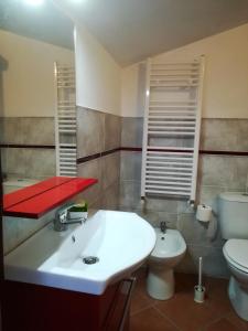 Ванна кімната в Casa Arcobaleno